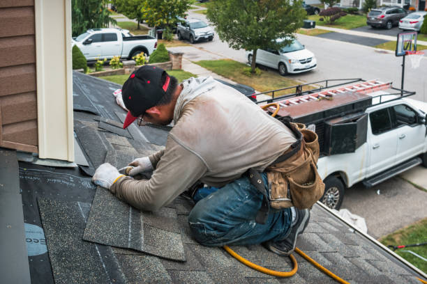 Professional Roofing technician working in Nome, TX